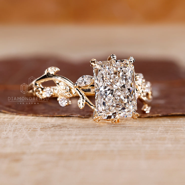 Six leaf style prong setting radiant diamond ring in yellow gold band