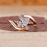 Pear diamond engagement ring in rose gold.