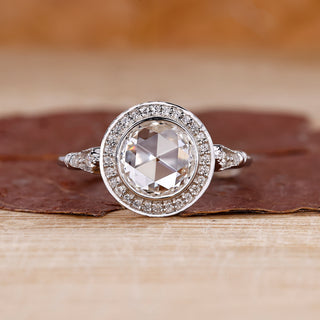 Round rose cut engagement ring with lab grown center diamond.
