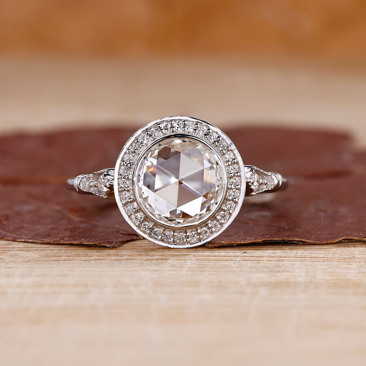 Round rose cut engagement ring with lab grown center diamond.
