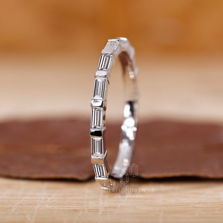 Bar set wedding band showcasing a unique setting style.