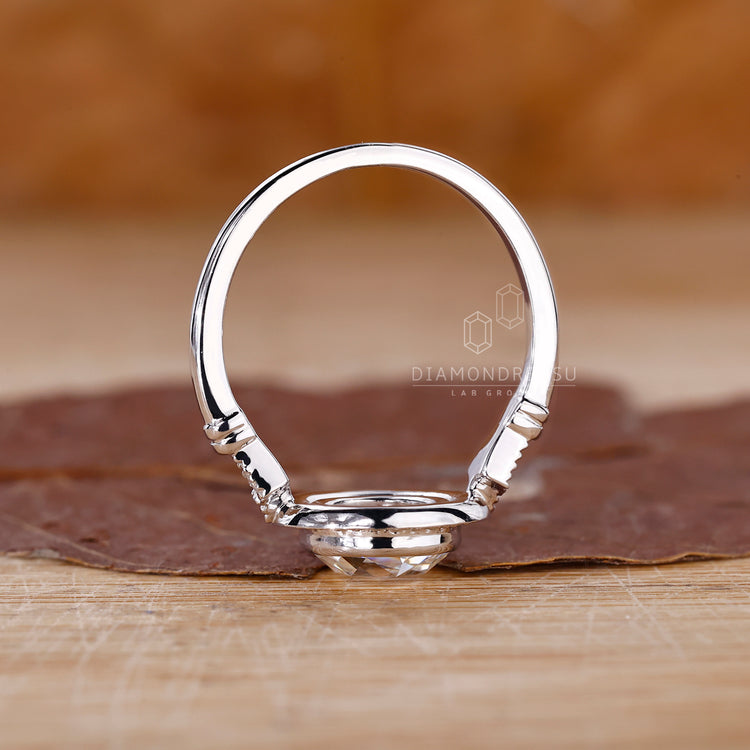 Handmade jewelry with a round rose cut and secure bezel design.