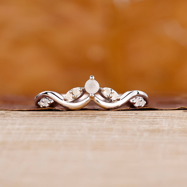 Moonstone wedding band with round cut moonstones.