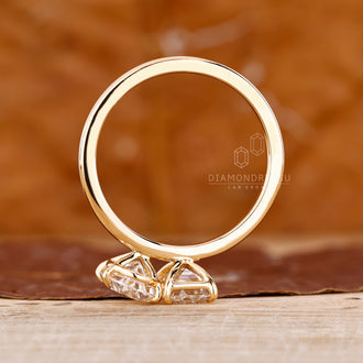 Lab Grown Diamond Toi et Moi engagement ring in yellow gold.
