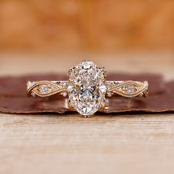 Vintage diamond engagement ring with intricate handmade details.