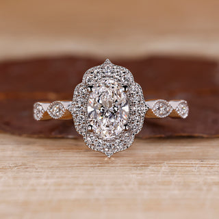 Oval shaped diamond engagement ring in white gold.