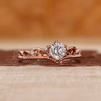 Custom round cut diamond engagement ring.