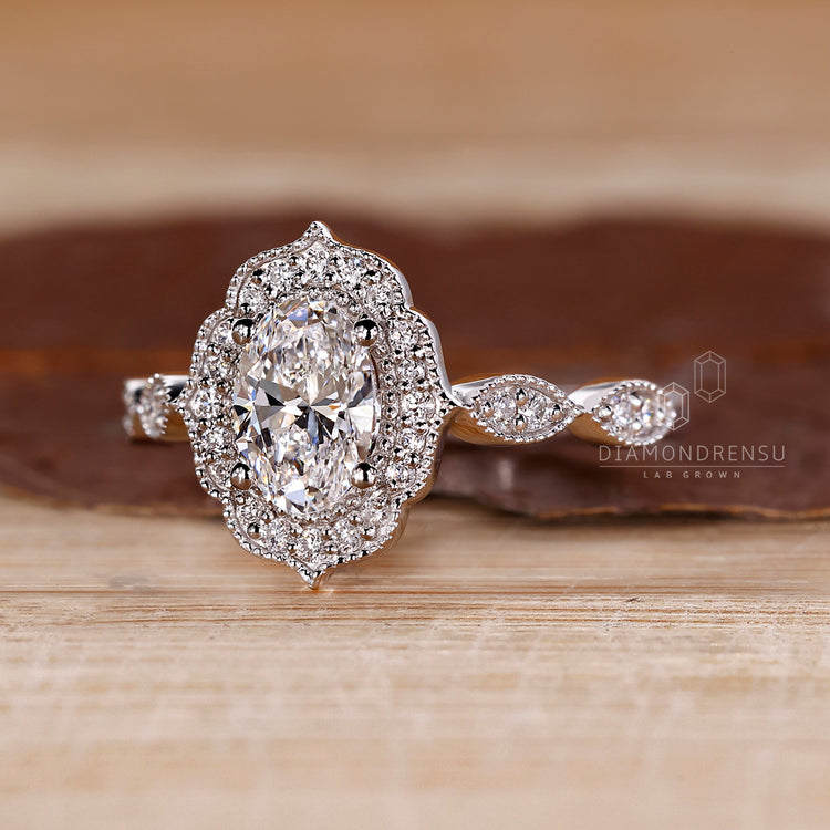 Milgrain setting engagement ring with 4 prongs.