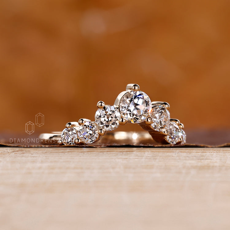 Curved wedding band handcrafted with precision and care.