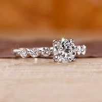 IGI certified 7 stone engagement ring with white gold band.