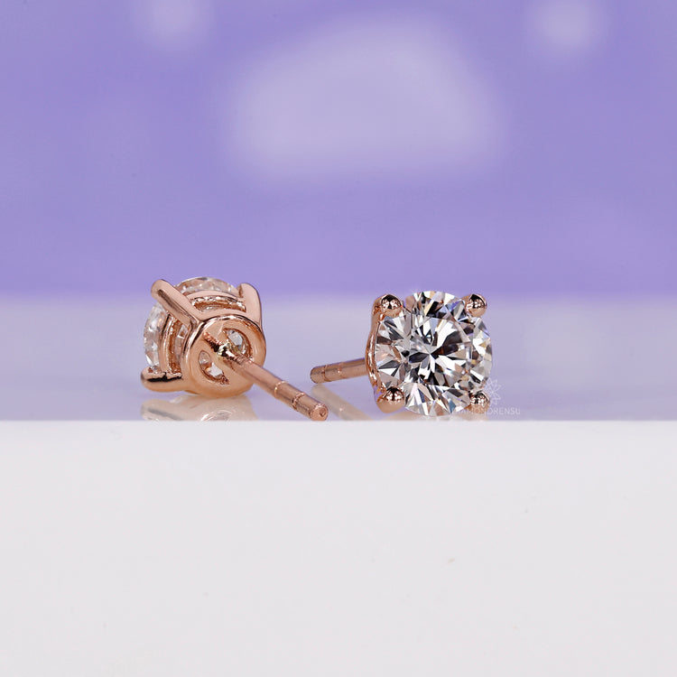 Stud earrings for women in a handmade jewelry design with rose gold accents.