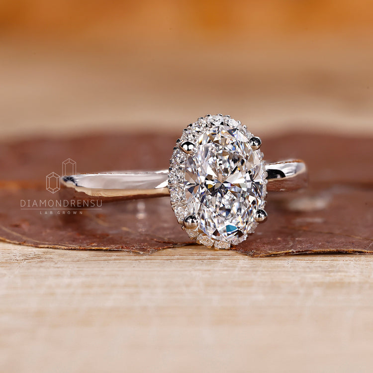 White Gold Ring with Halo Setting Diamond Ring for added brilliance.