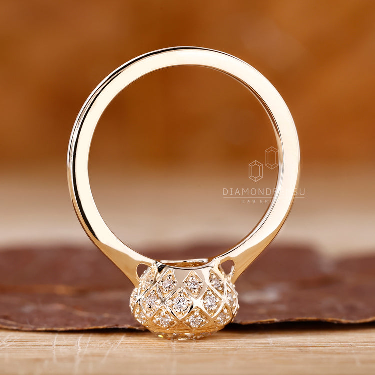 Vintage Diamond Ring with a round cut diamond set in a tapered ring shank.