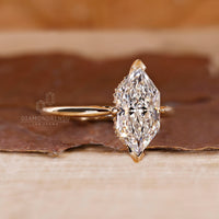 V Prong Ring with a round diamond and yellow gold band in a custom design.