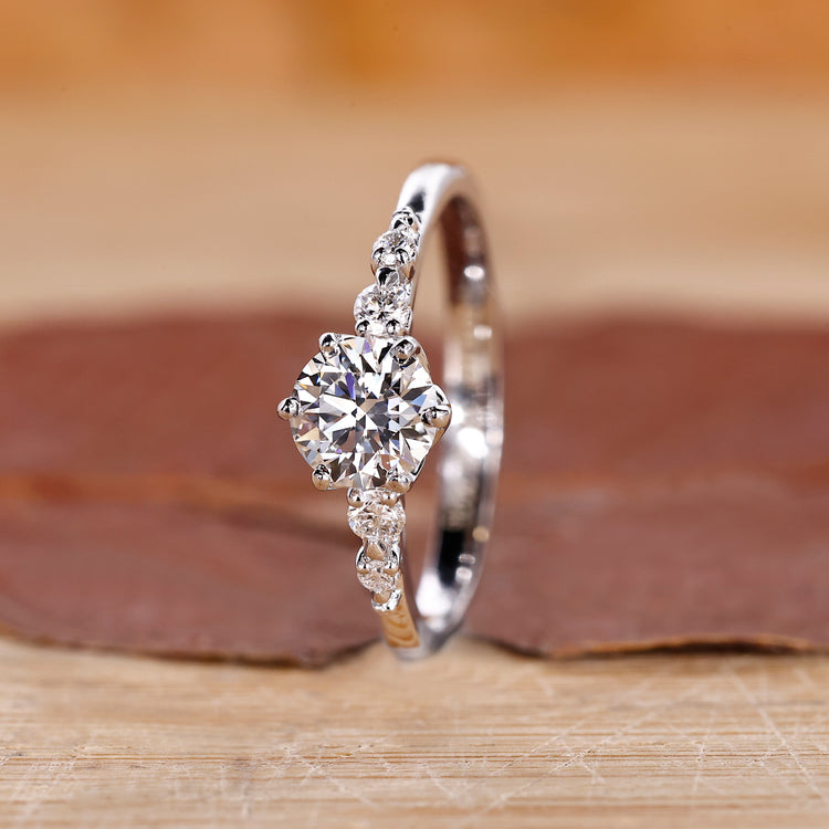 5 diamond ring with tapered shank band and white gold engagement ring featuring 6 round prong setting.