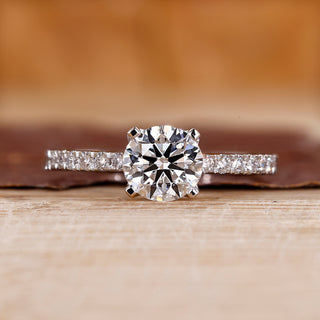 This round diamond engagement ring brings a classic look.