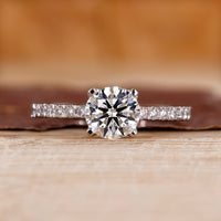 This round diamond engagement ring brings a classic look.