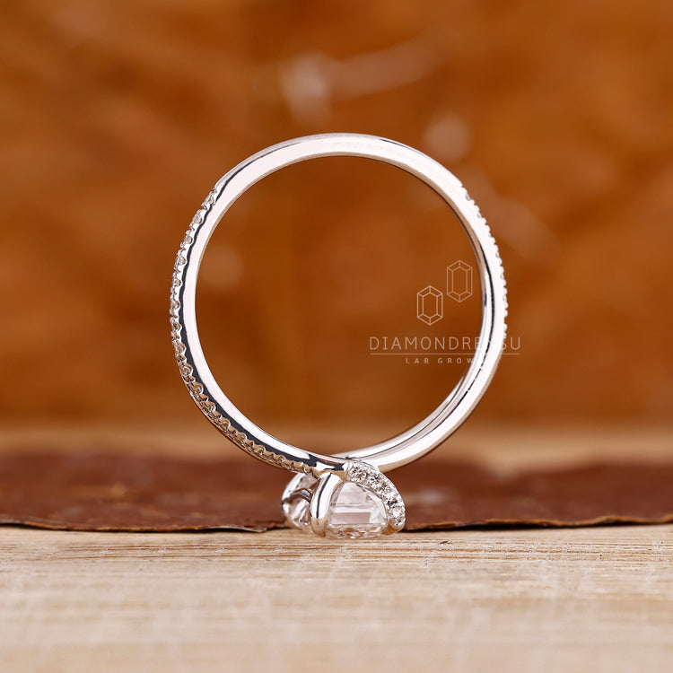 IGI certified emerald shape diamond ring.