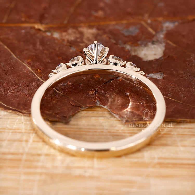 Buy engagement ring with lab grown diamonds and shared prong 5 stone design.