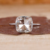 Cushion rose cut engagement ring with soft curves and a romantic design.