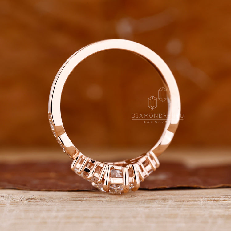 Lab grown diamond pear cut engagement ring with IGI certified stones.