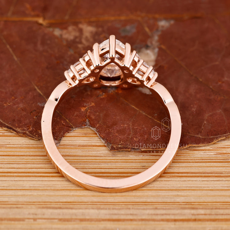 Handmade ring featuring pear cut and marquise shape pave.