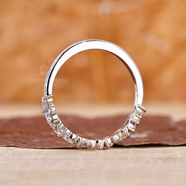 Lab grown diamond band with a half eternity setting.