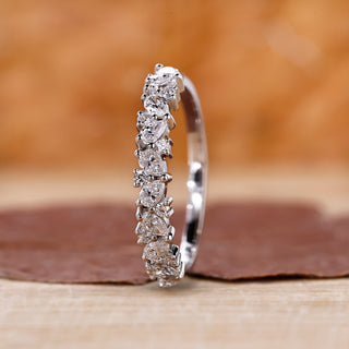 White gold half eternity band featuring lab grown diamonds.