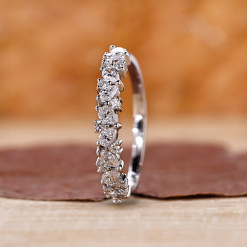 White gold half eternity band featuring lab grown diamonds.