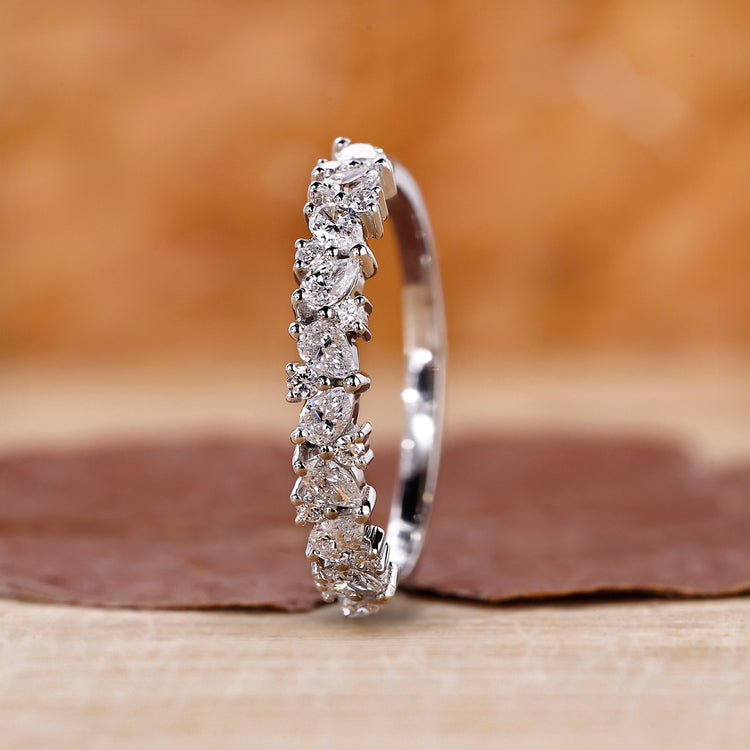 White gold half eternity band featuring lab grown diamonds.