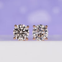 4 Carat Diamond Stud Earrings with a classic diamond prong setting.