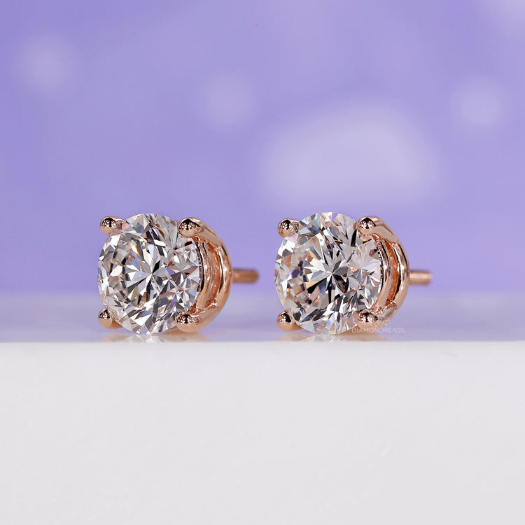 Diamond stud earrings for women with a modern rose gold finish.
