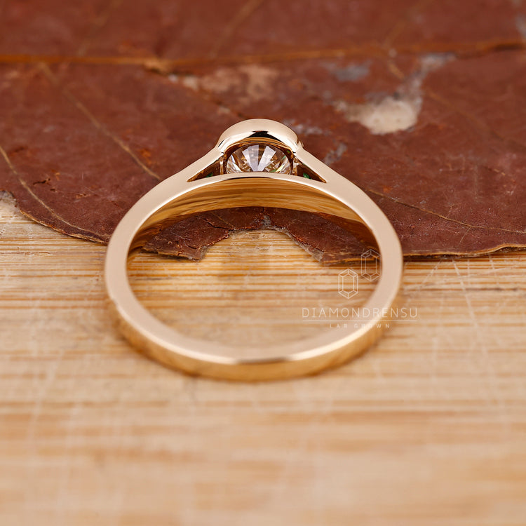 Buy engagement ring online featuring a three stone setting and eco-friendly diamonds.