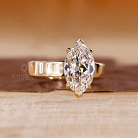 Yellow gold diamond ring with Old European cut solitaire setting.