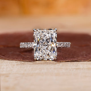 Radiant cut diamond engagement ring featuring a beautiful center stone in a classic design.