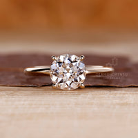 Round old European cut solitaire diamond ring.