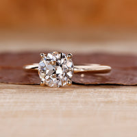 Round old European cut diamond ring in yellow gold.