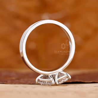 Lab Grown Diamond Toi et Moi ring with pear and radiant stones.