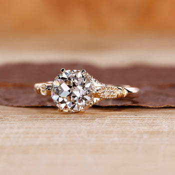 Old European cut diamond ring with vintage design.