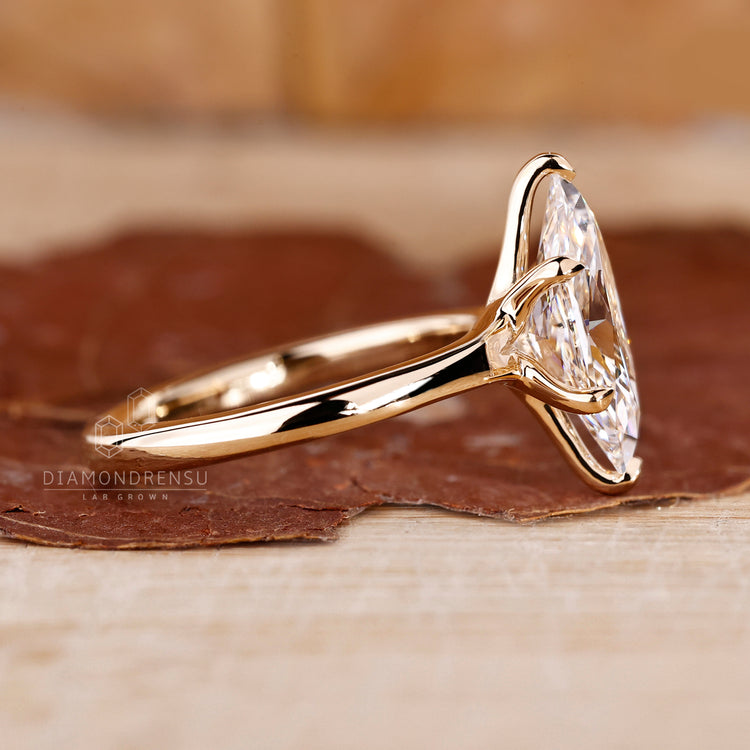Lab grown diamond set in a Dutch marquise ring with solitaire setting and 6 claw prong in handmade jewelry.