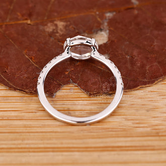 Custom diamond ring with rose cut engagement diamond and open gallery.