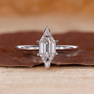 Long hexagon cut engagement ring featuring a beautiful solitaire design.