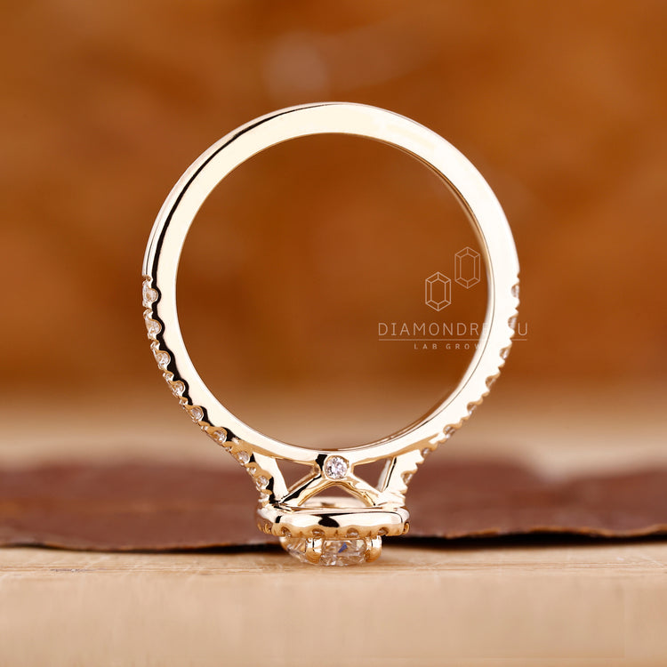 Proposal ring with oval and round diamonds.