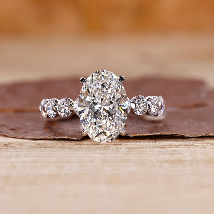White gold oval diamond ring crafted for a bright and timeless look.