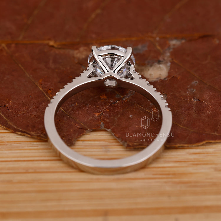 Handmade jewelry piece with custom round diamond setting.
