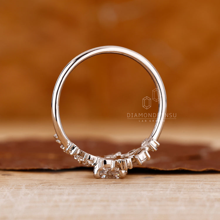 Round And Marquise Diamoand Ring In Bypass Setting
