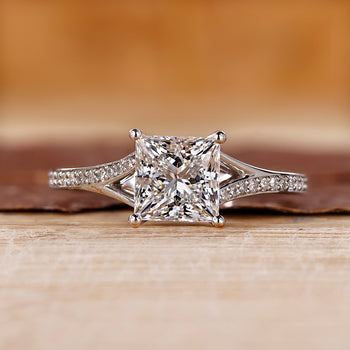 Princess cut engagement ring with cathedral setting.