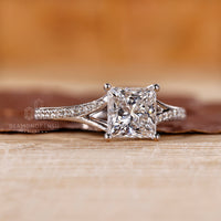 Custom princess cut engagement ring in white gold with 4 prong setting.