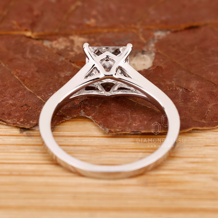 Unique engagement ring with pave setting and custom design.