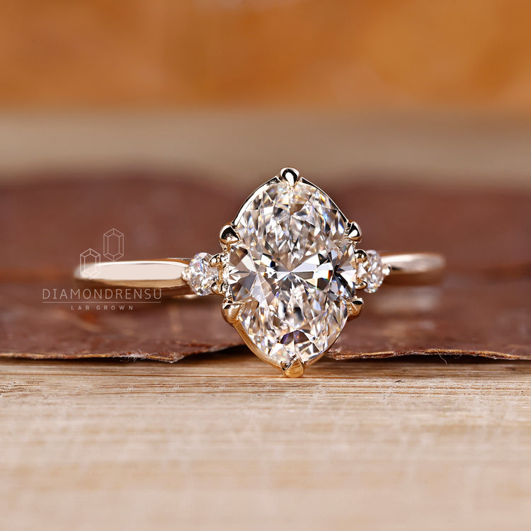Cathedral setting ring on yellow gold engagement ring.